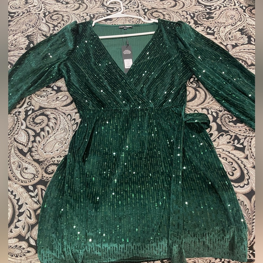 Beautiful sequin green dress.